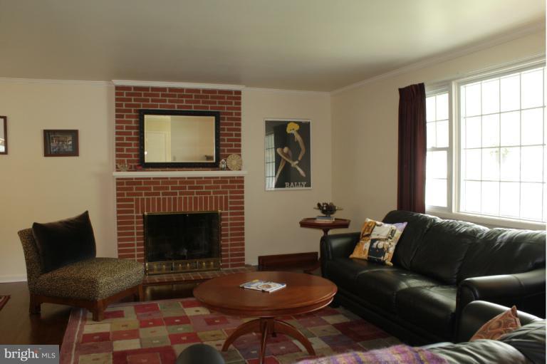 210 Margate Road Lutherville-Timonium, MD 21093 - Photo 5 of 19 Nicely appointed living room with fireplace