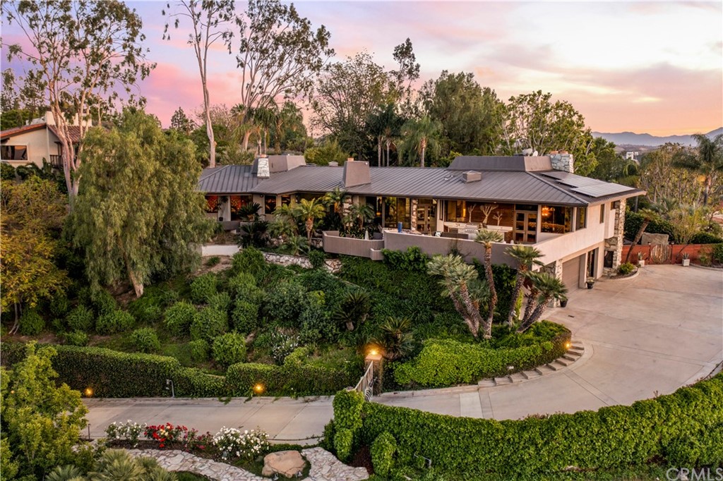 2242 Rockwell Road Riverside, CA 92506 - Photo 1 of 1 a aerial view of a house with a yard and potted plants