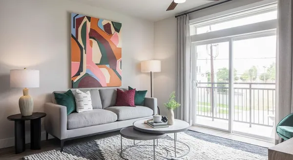a living room with furniture and a window