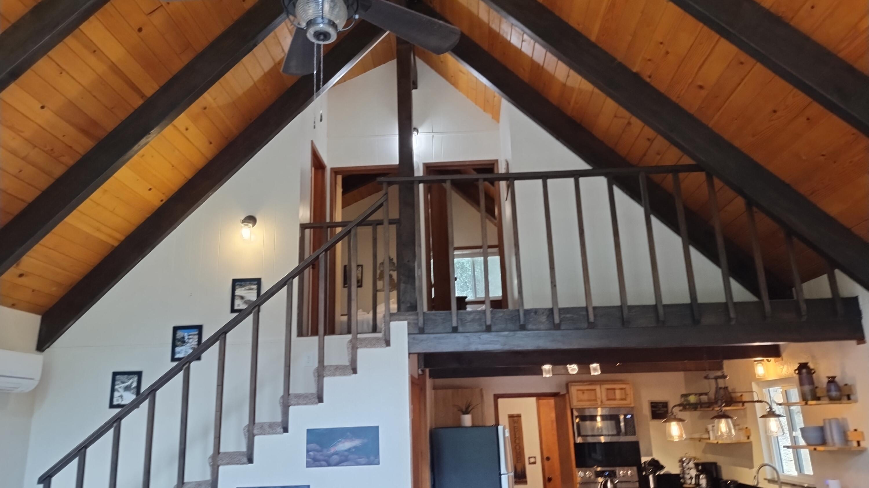 1693 Forest Rte 21S94 Camp Nelson, CA 93265 - Photo 38 of 86 a view of staircase with railing and white walls