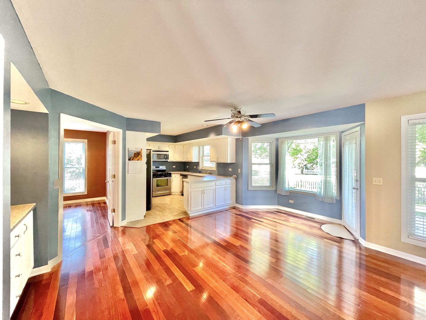 2250 Lakeside Drive Aurora, IL 60504 - Photo 4 of 26 a spacious bedroom with a bed cabinet and a large window