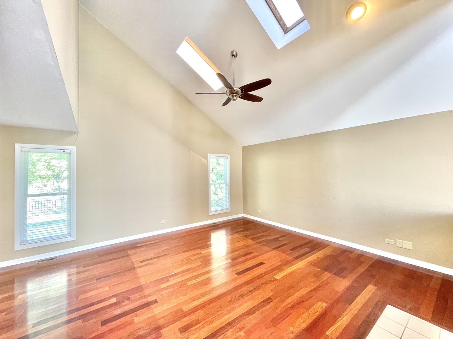 2250 Lakeside Drive Aurora, IL 60504 - Photo 10 of 26 a view of empty room with wooden floor and fan