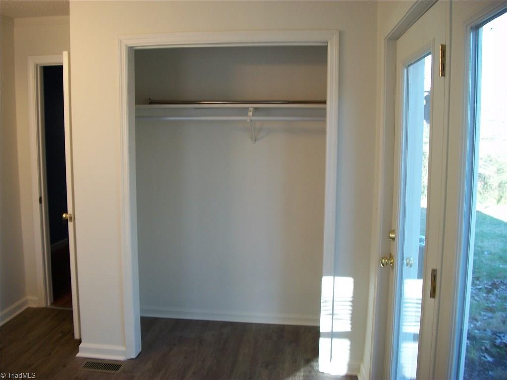 785 Light Road Thomasville, NC 27360 - Photo 17 of 21 MASTER BATHROOM, ADDITIONAL CLOSET, GLASS DOORS FOR MORE LIGHT, OPEN IN THE SPRING FOR FRESH CAROLINA BREEZE.