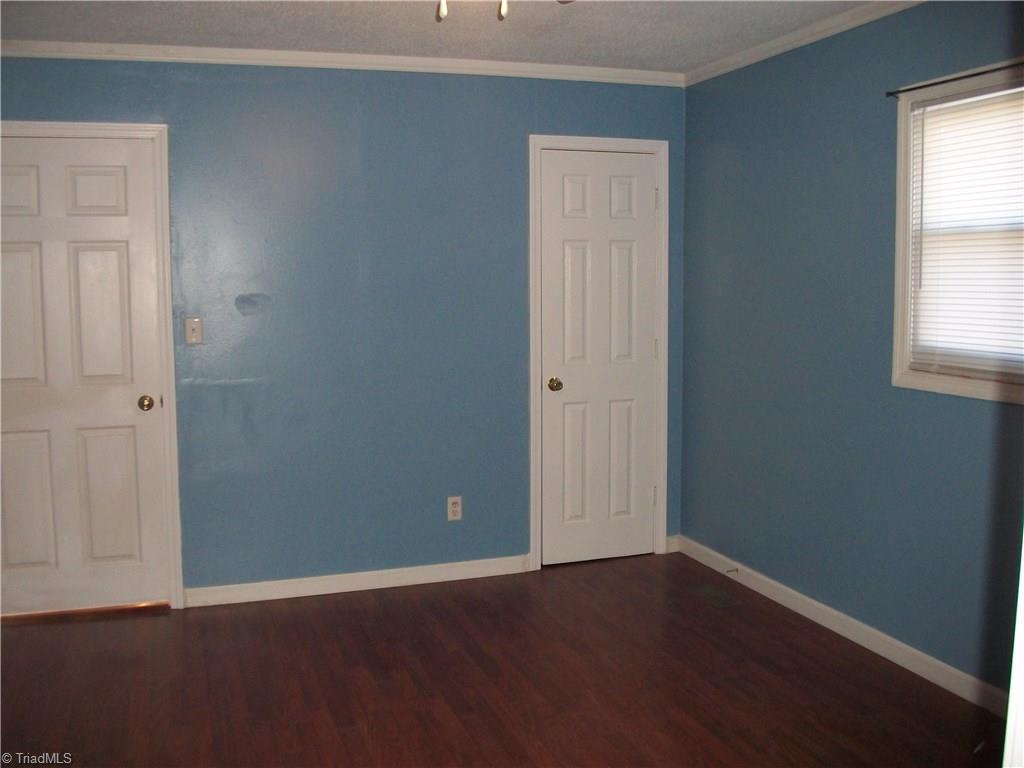 785 Light Road Thomasville, NC 27360 - Photo 18 of 21 LARGE MASTER BEDROOM/DOUBLE CLOSETS/TRIM WORK/NEW LAMINATE FLOORING