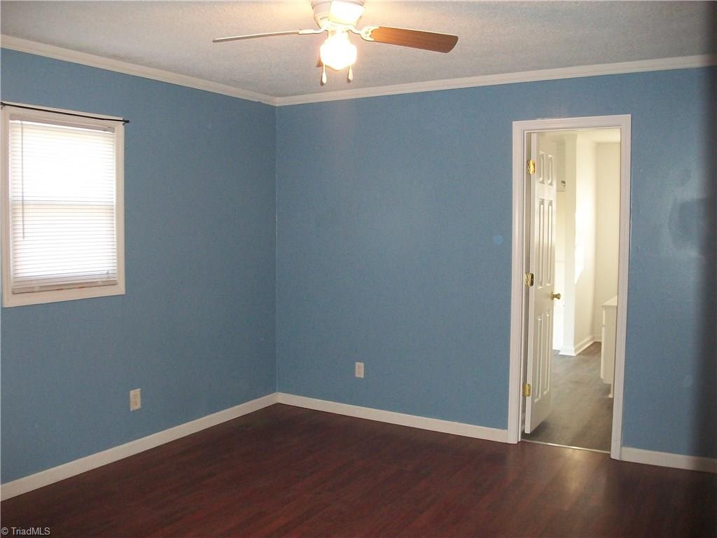 785 Light Road Thomasville, NC 27360 - Photo 19 of 21 MASTER BEDROOM WITH ATTACHED MASTER BATHROOM