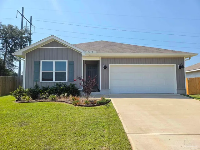 a front view of house with yard