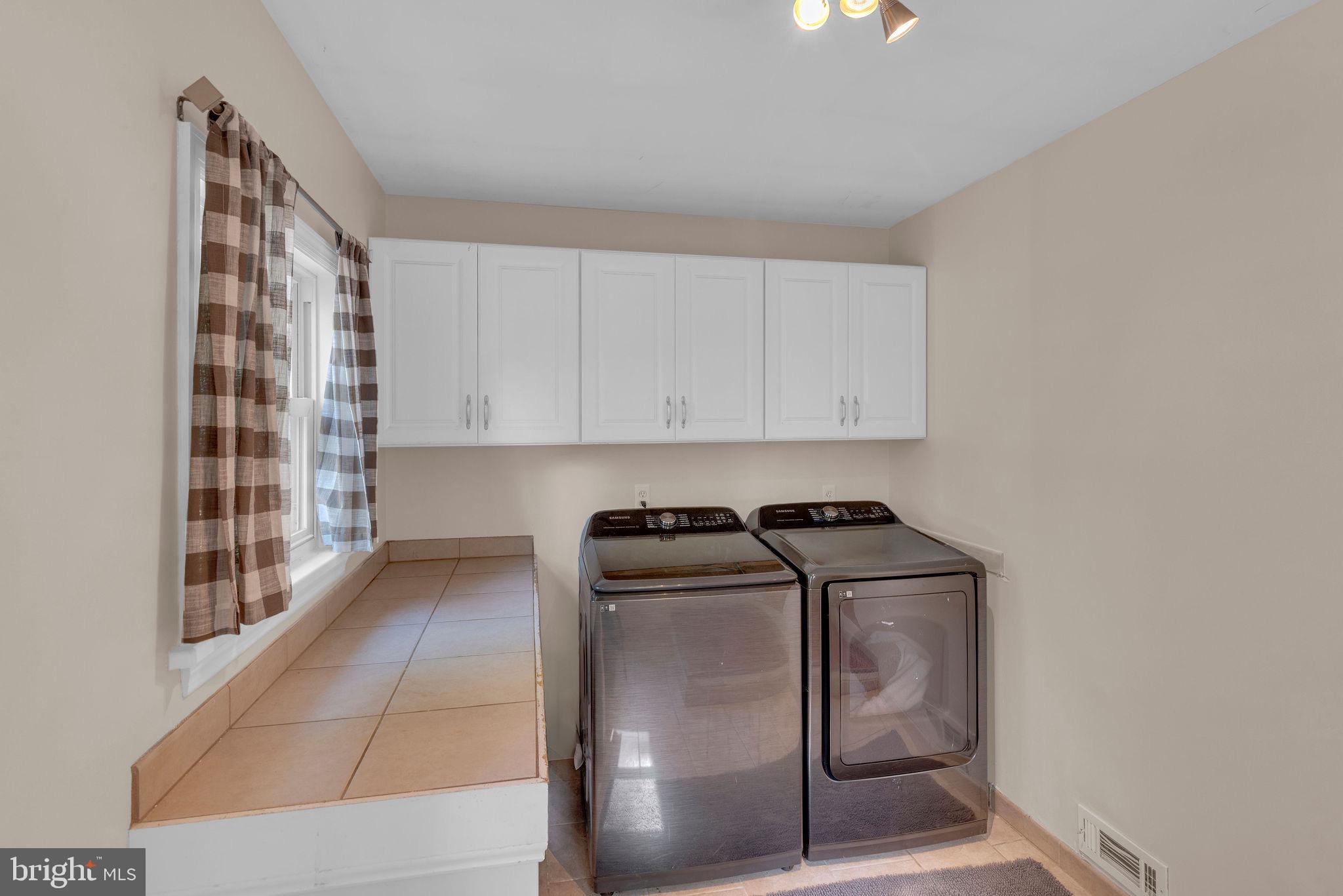 218 Keeley Avenue Doylestown, PA 18901 - Photo 22 of 42 a utility room with dryer and washer
