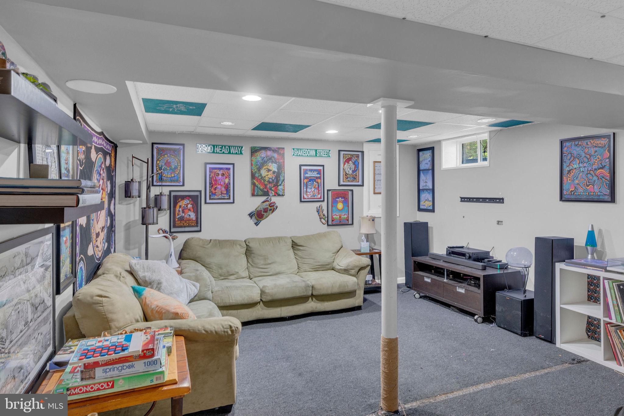 218 Keeley Avenue Doylestown, PA 18901 - Photo 27 of 42 a living room with furniture and a flat screen tv