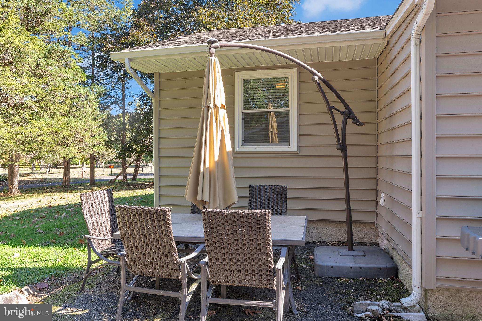 218 Keeley Avenue Doylestown, PA 18901 - Photo 29 of 42 a view of a patio with a table and chairs