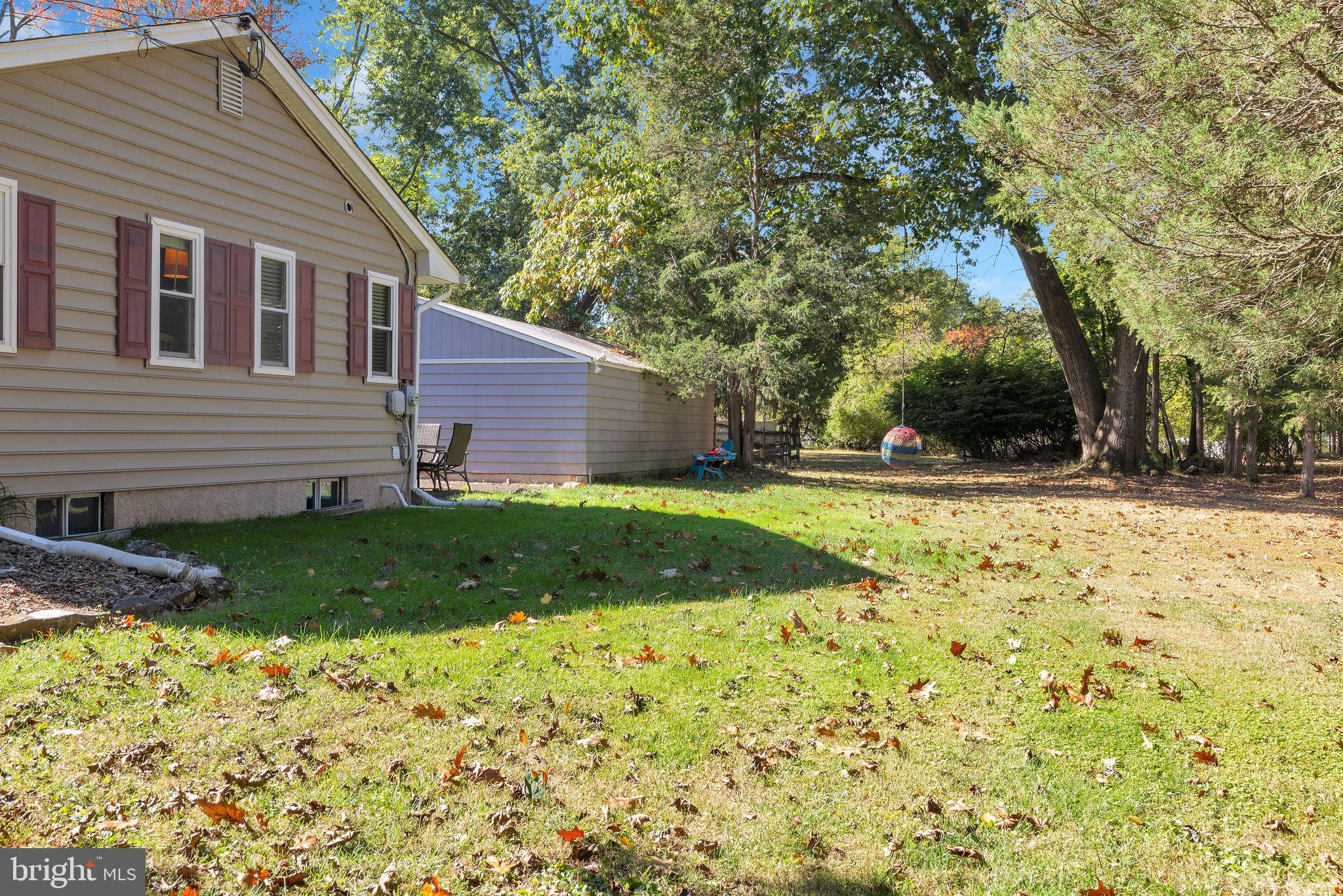 218 Keeley Avenue Doylestown, PA 18901 - Photo 34 of 42 a view of a yard with plants and large tree