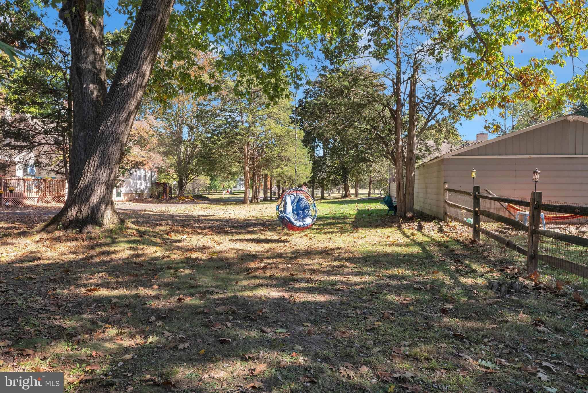 218 Keeley Avenue Doylestown, PA 18901 - Photo 5 of 42 a view of outdoor space with deck and trees