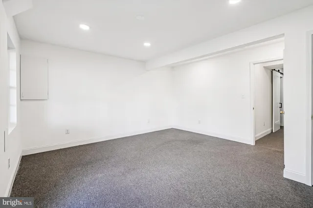 an empty room with a natural light
