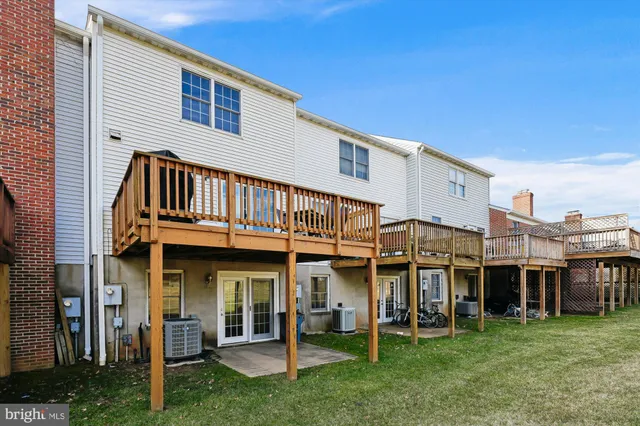 a view of a street with cars parked