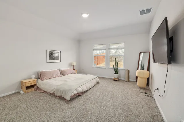 a view of a hallway with a living room