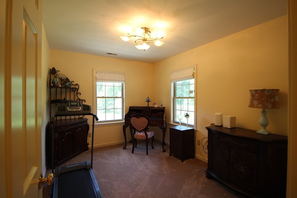 5 Gableview Lane Southwick, MA 01077 - Photo 30 of 41 a living room with furniture and a window