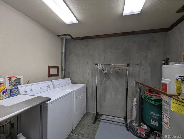 a view of room with wooden floor