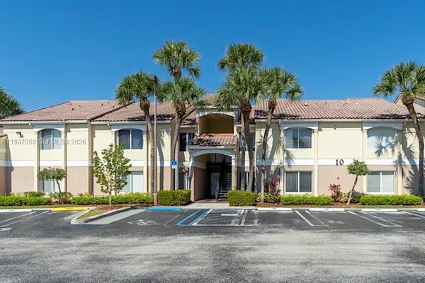 a front view of a house with yard