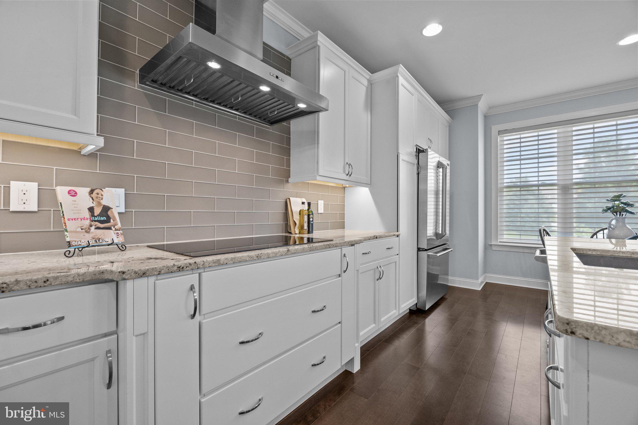 23 David Drive Newtown, PA 18940 - Photo 11 of 44 a kitchen with granite countertop cabinets a sink a window and stainless steel appliances