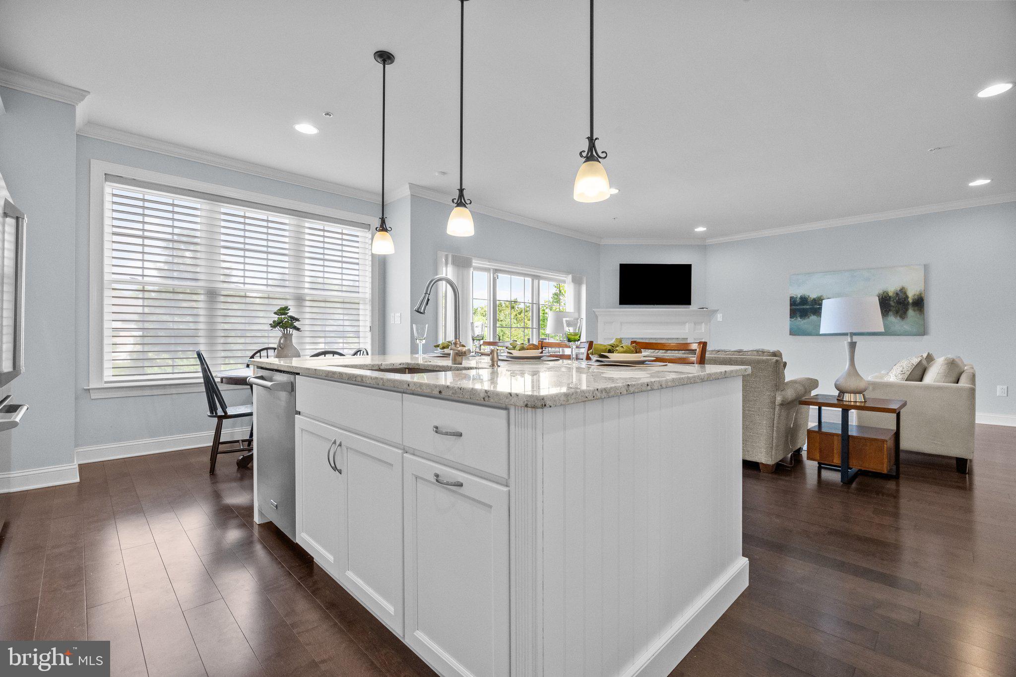 23 David Drive Newtown, PA 18940 - Photo 13 of 44 a kitchen with kitchen island granite countertop a sink counter top space and stainless steel appliances