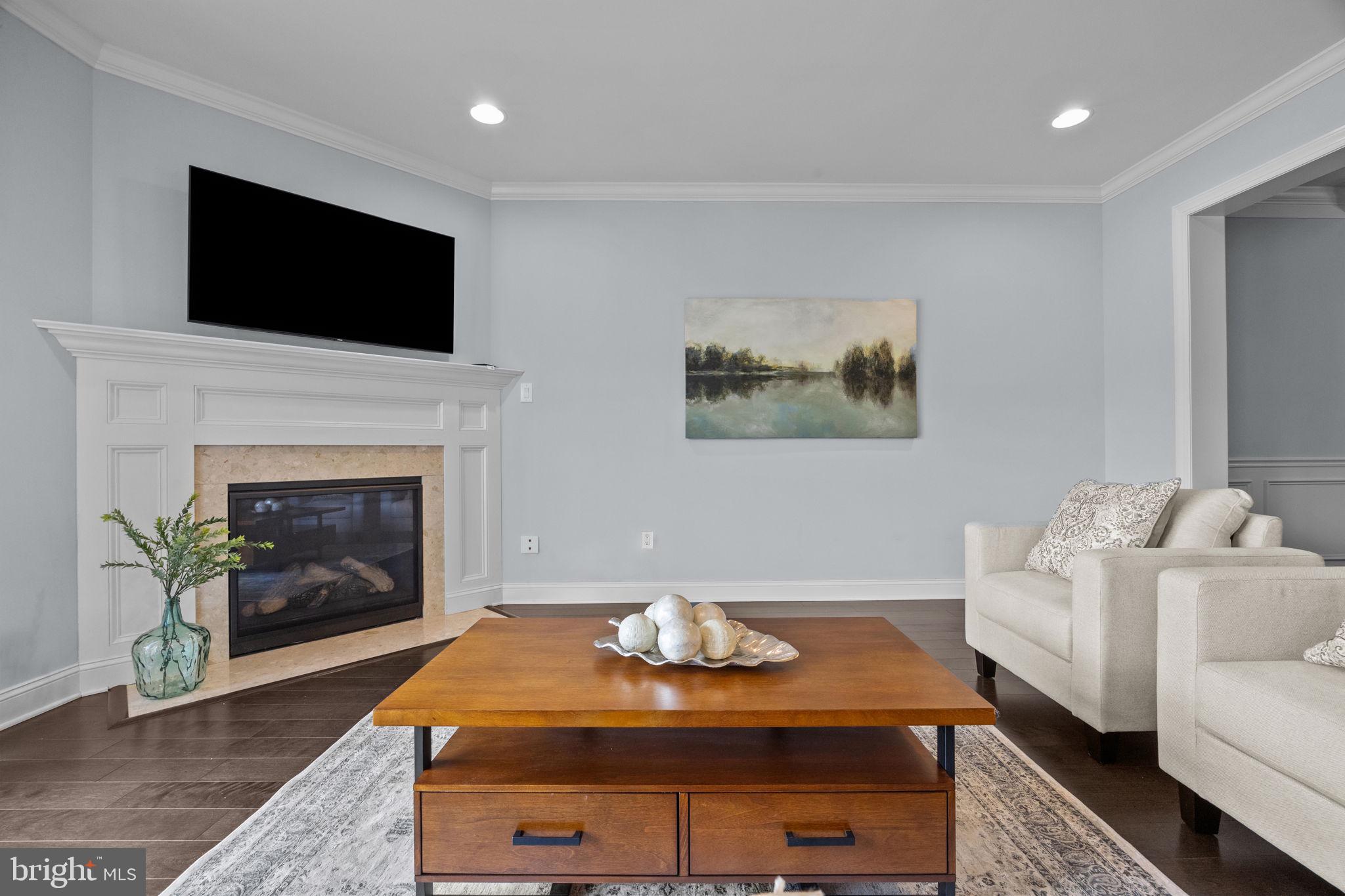 23 David Drive Newtown, PA 18940 - Photo 15 of 44 a living room with furniture and a fireplace