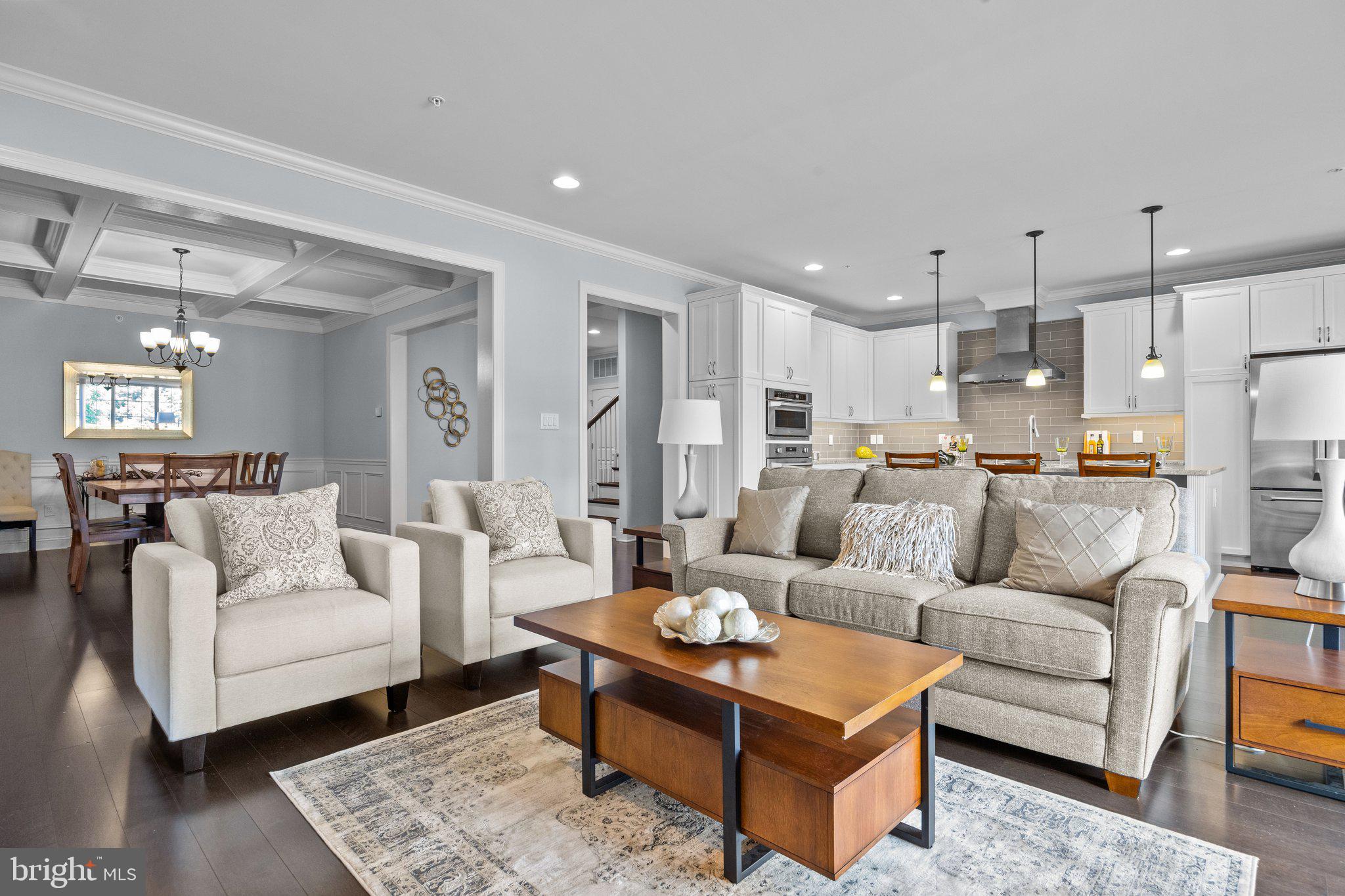 23 David Drive Newtown, PA 18940 - Photo 18 of 44 a living room with furniture kitchen view and a table