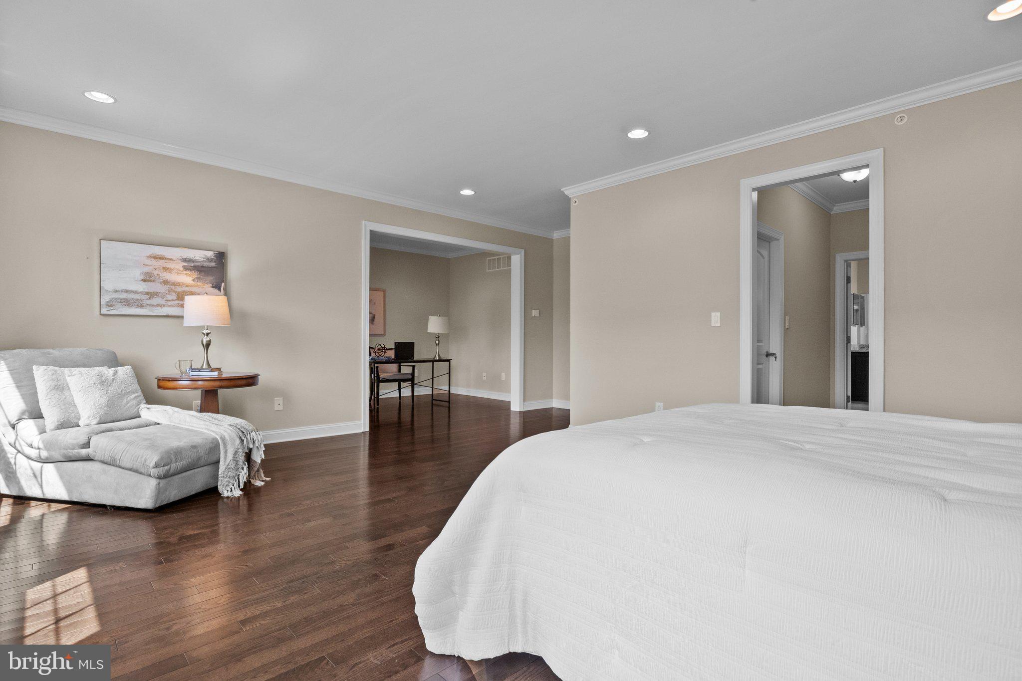 23 David Drive Newtown, PA 18940 - Photo 23 of 44 a spacious bedroom with a bed and wooden floor