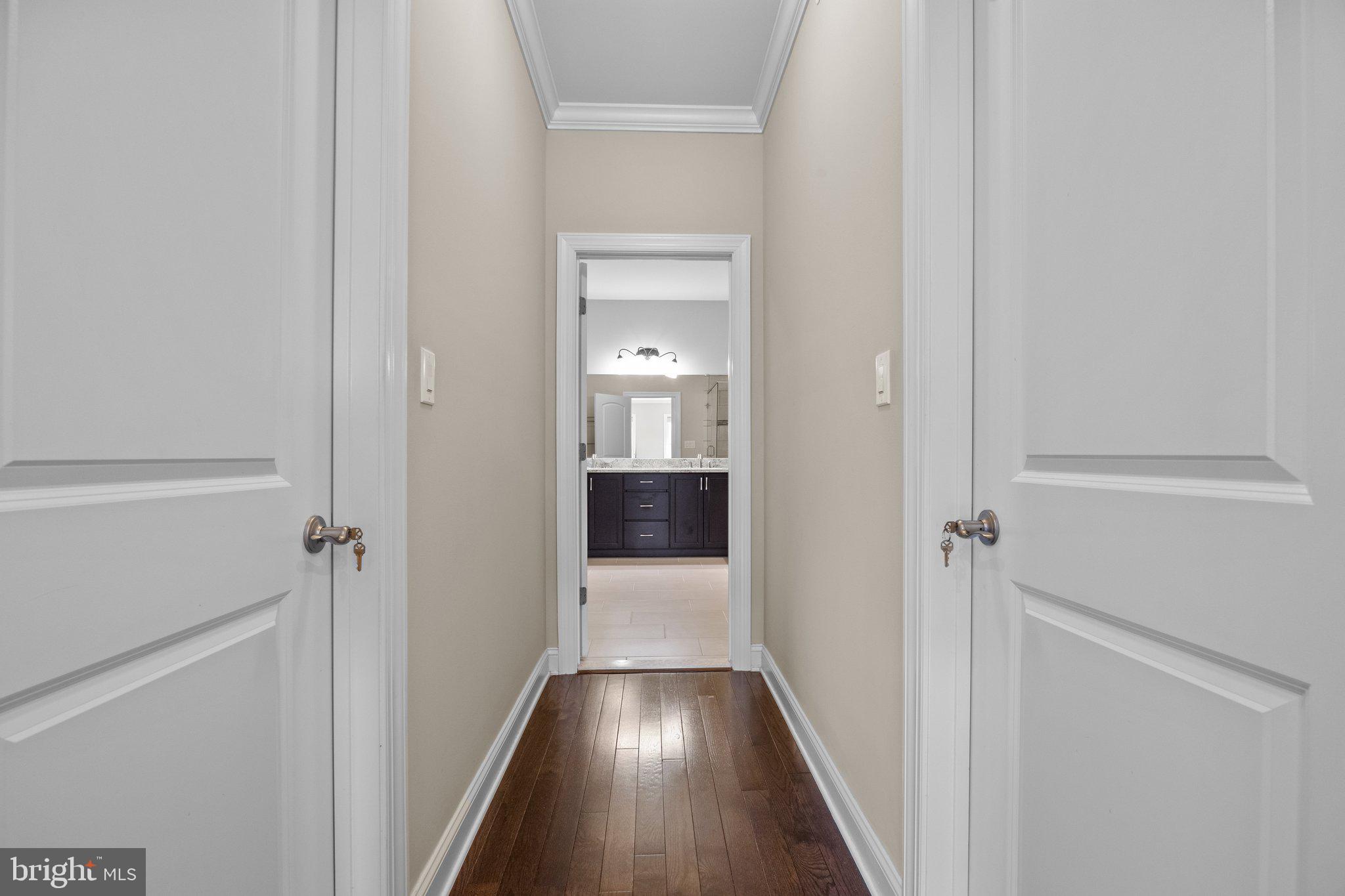 23 David Drive Newtown, PA 18940 - Photo 26 of 44 a view of a hallway with wooden floor