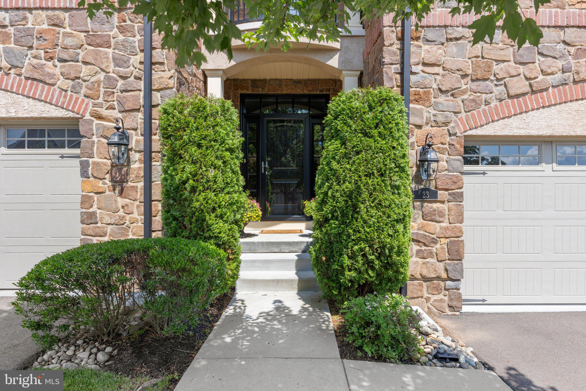 23 David Drive Newtown, PA 18940 - Photo 3 of 44 a house with a tree in front of it