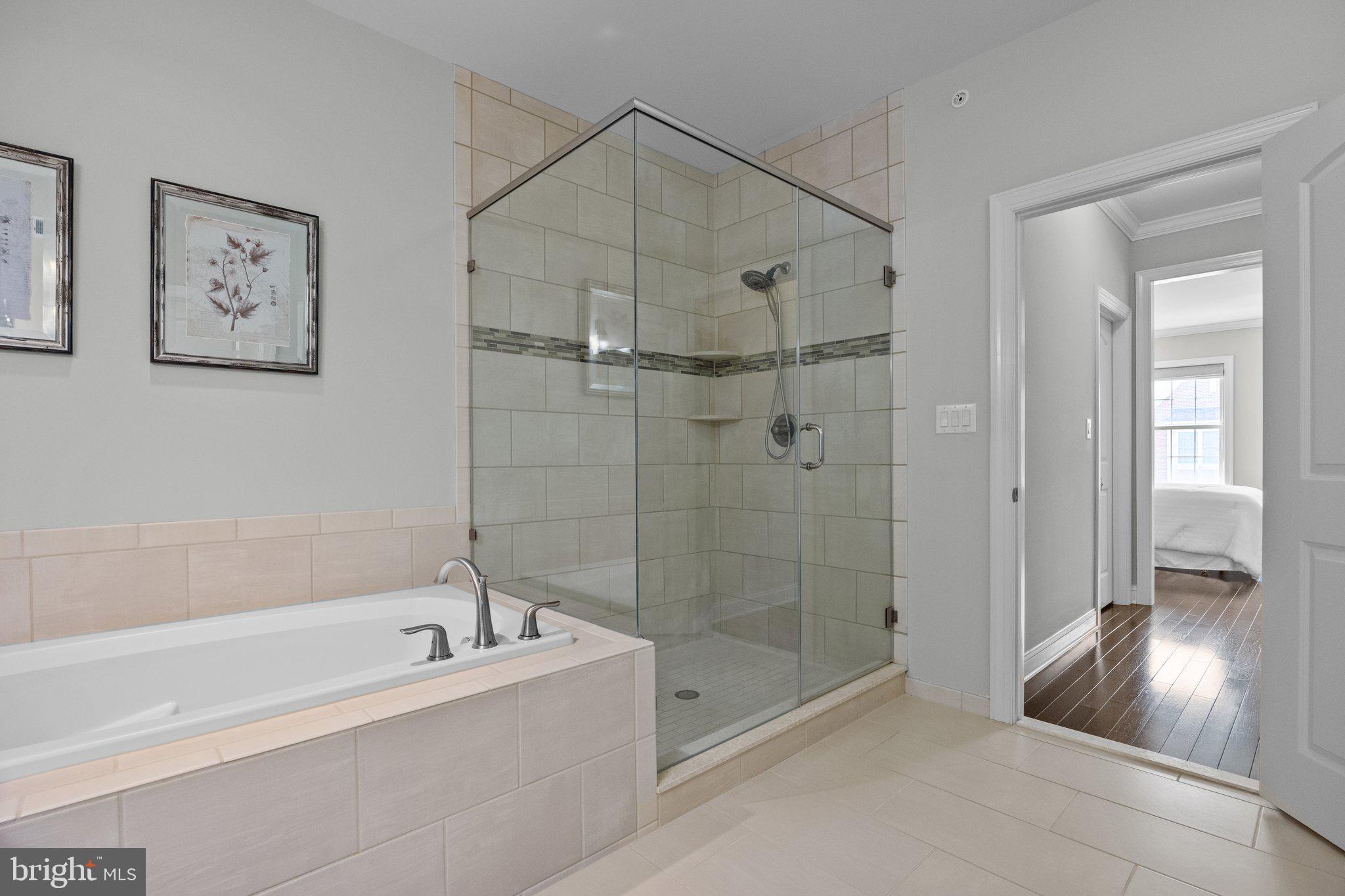 23 David Drive Newtown, PA 18940 - Photo 31 of 44 a bathroom with a bathtub and a shower