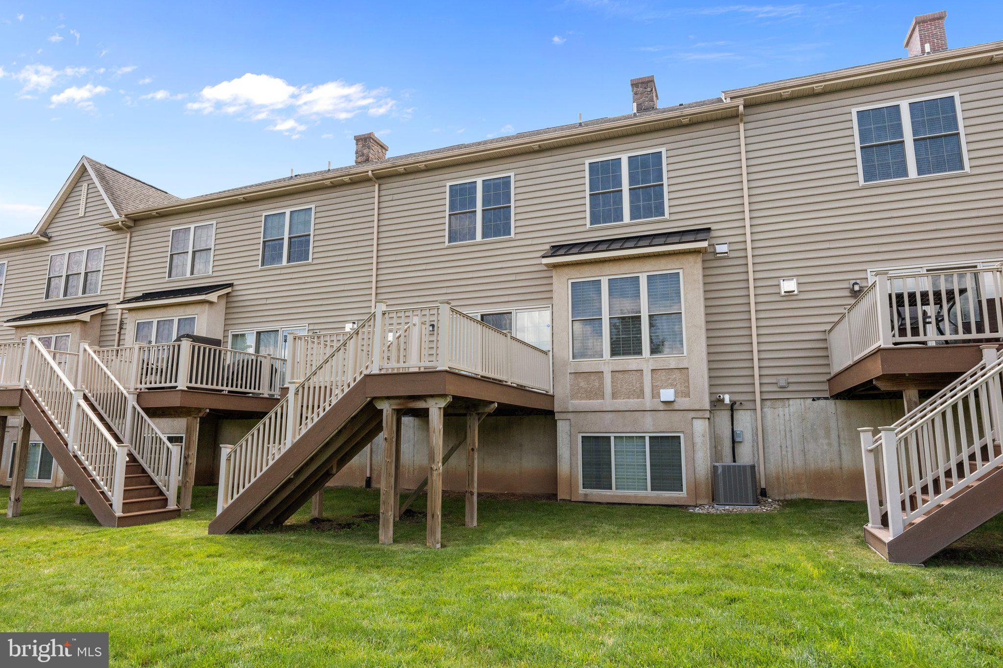 23 David Drive Newtown, PA 18940 - Photo 42 of 44 a front view of a house with a yard