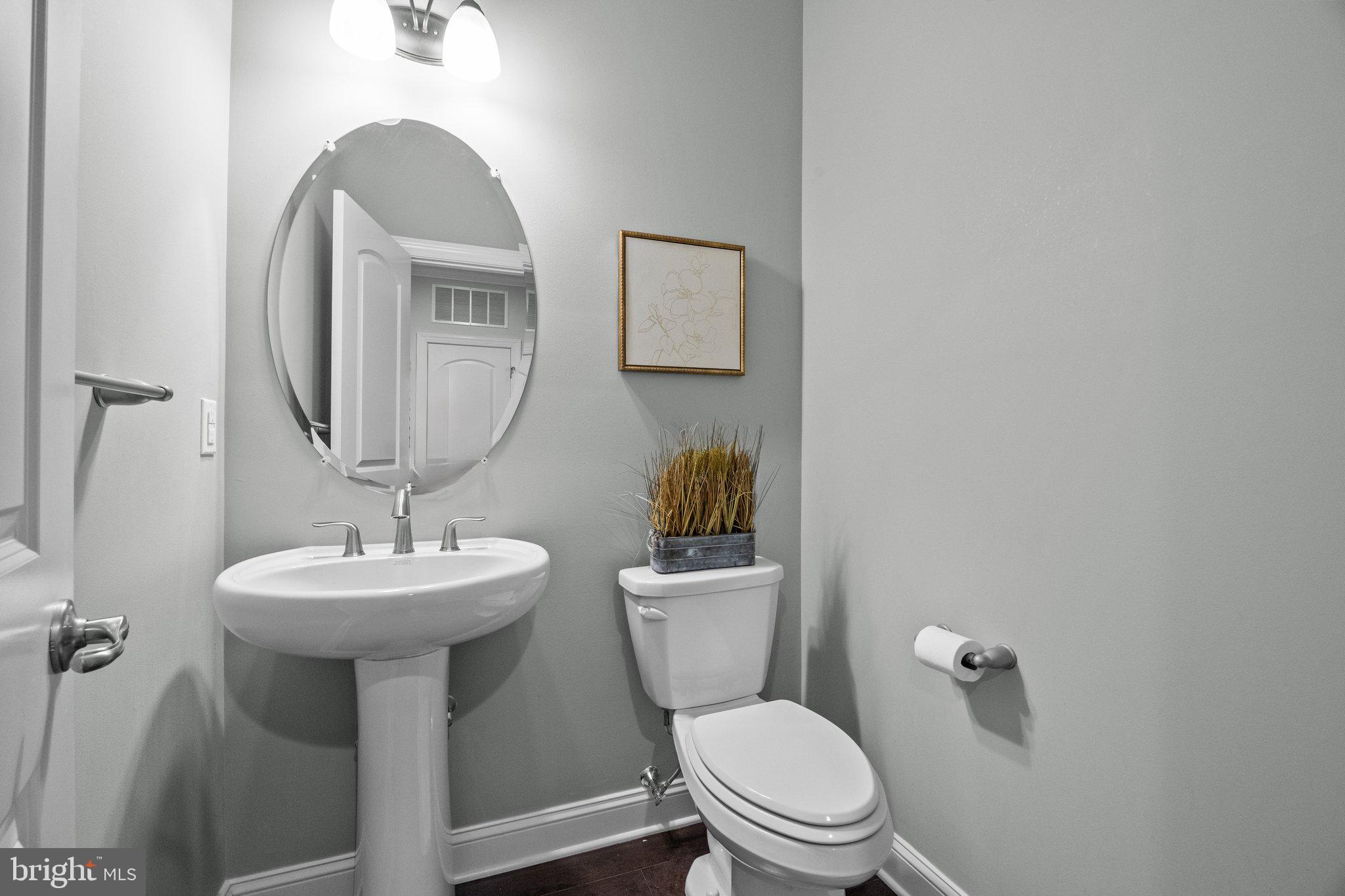 23 David Drive Newtown, PA 18940 - Photo 6 of 44 a bathroom with a toilet sink and mirror