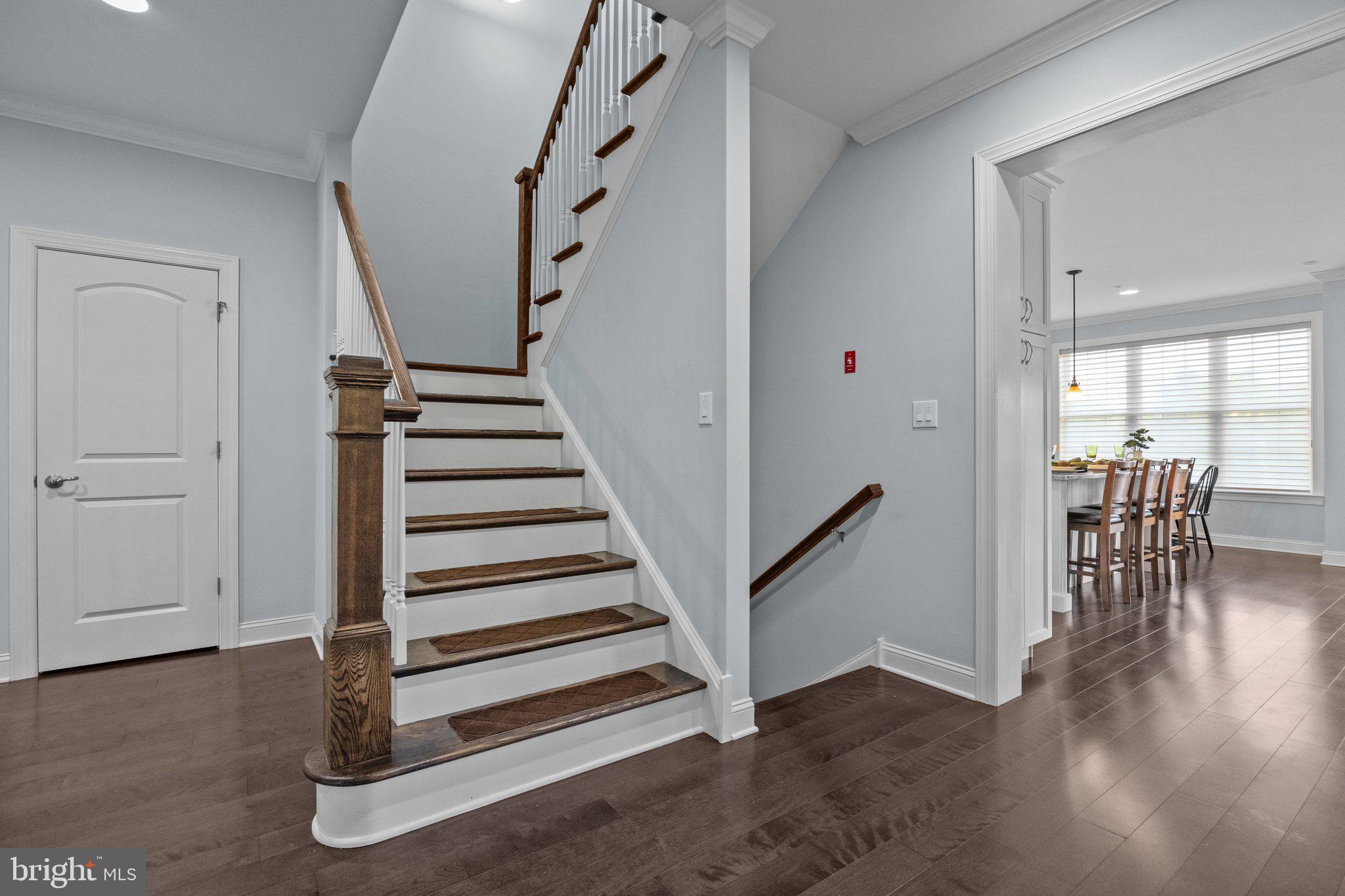 23 David Drive Newtown, PA 18940 - Photo 7 of 44 a view of entryway and hall with wooden floor