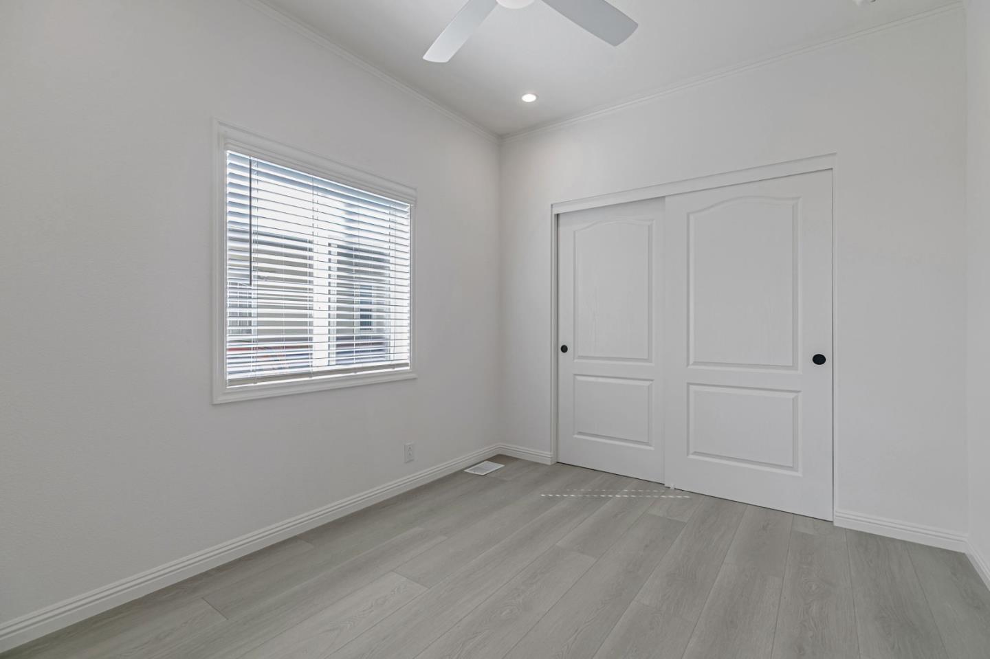 555 Umbarger Road, Unit 131 San Jose, CA 95111 - Photo 16 of 32 an empty room with windows