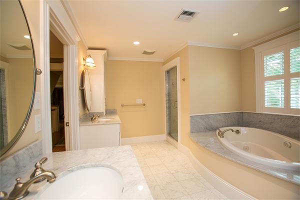 37 Beechwood Road Wellesley, MA 02482 - Photo 19 of 24 a spacious bathroom with a tub sink and mirror