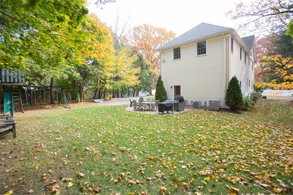 37 Beechwood Road Wellesley, MA 02482 - Photo 21 of 24 a front view of a house with a yard