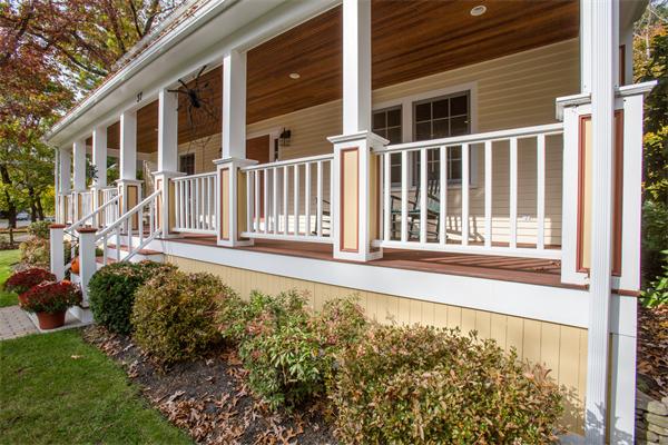 37 Beechwood Road Wellesley, MA 02482 - Photo 3 of 24 a view of a house with a small yard and wooden floor and fence