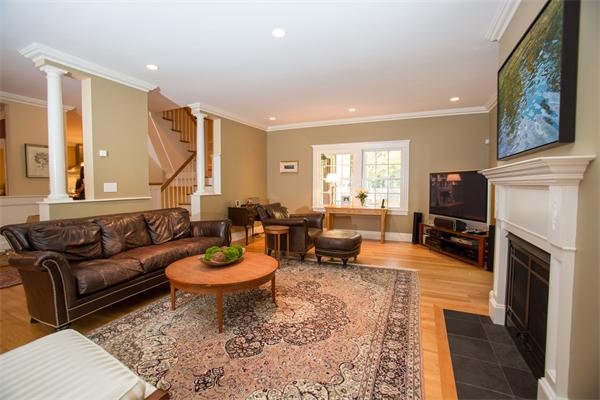 37 Beechwood Road Wellesley, MA 02482 - Photo 7 of 24 a living room with furniture a flat screen tv and a fireplace