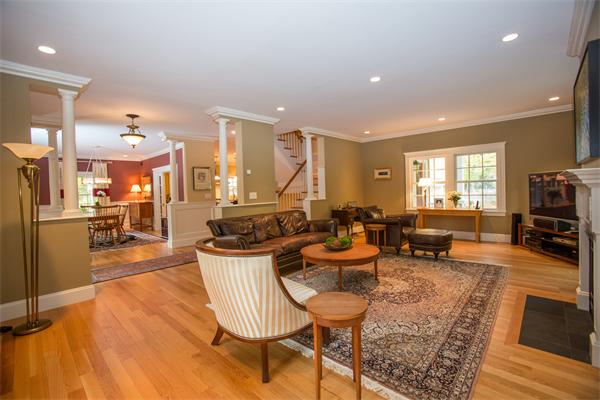 37 Beechwood Road Wellesley, MA 02482 - Photo 8 of 24 a living room with furniture a flat screen tv and a table