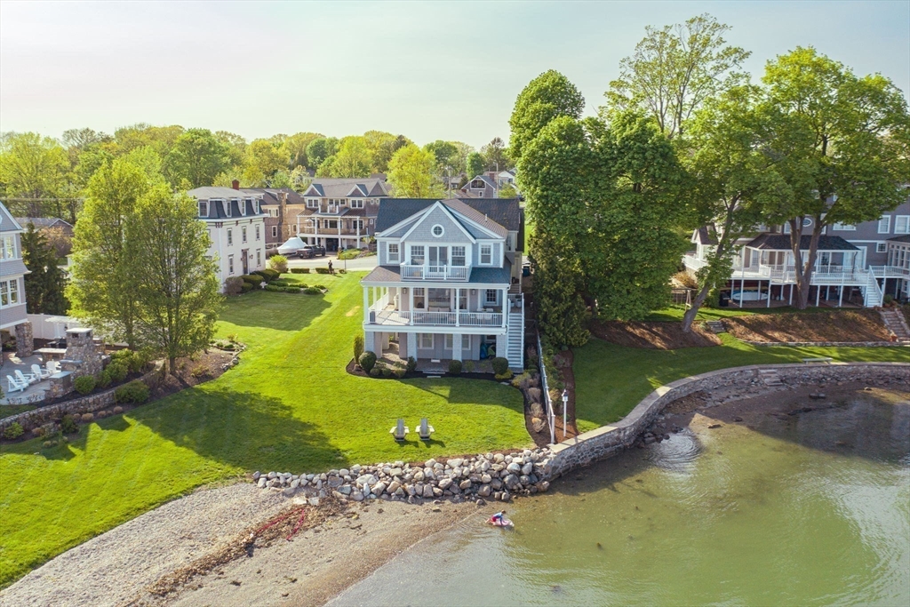 151 Downer Avenue Hingham, MA 02043 - Photo 19 of 19 a view of a house with a yard and swimming pool