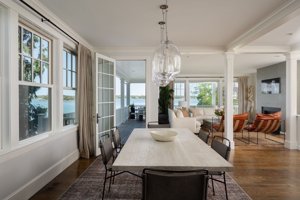 151 Downer Avenue Hingham, MA 02043 - Photo 8 of 19 a view of a dining room with furniture window and wooden floor