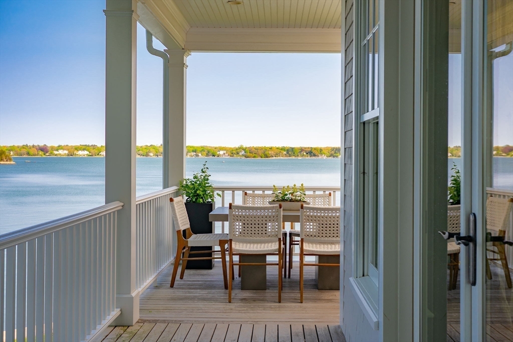 151 Downer Avenue Hingham, MA 02043 - Photo 10 of 19 a view of a dining room with furniture window and outside view