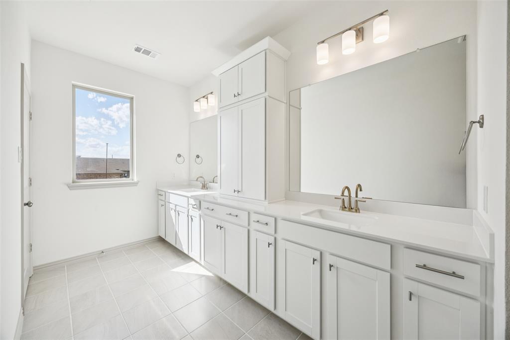 1023 Magdalena Way Midlothian, TX 76065 - Photo 7 of 16 Plenty of space for two in this wonderful owner's bath.