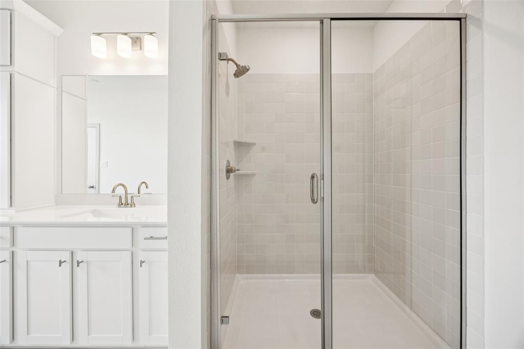 1023 Magdalena Way Midlothian, TX 76065 - Photo 8 of 16 Your new owner's bath comes complete with an oversized, walk in shower.