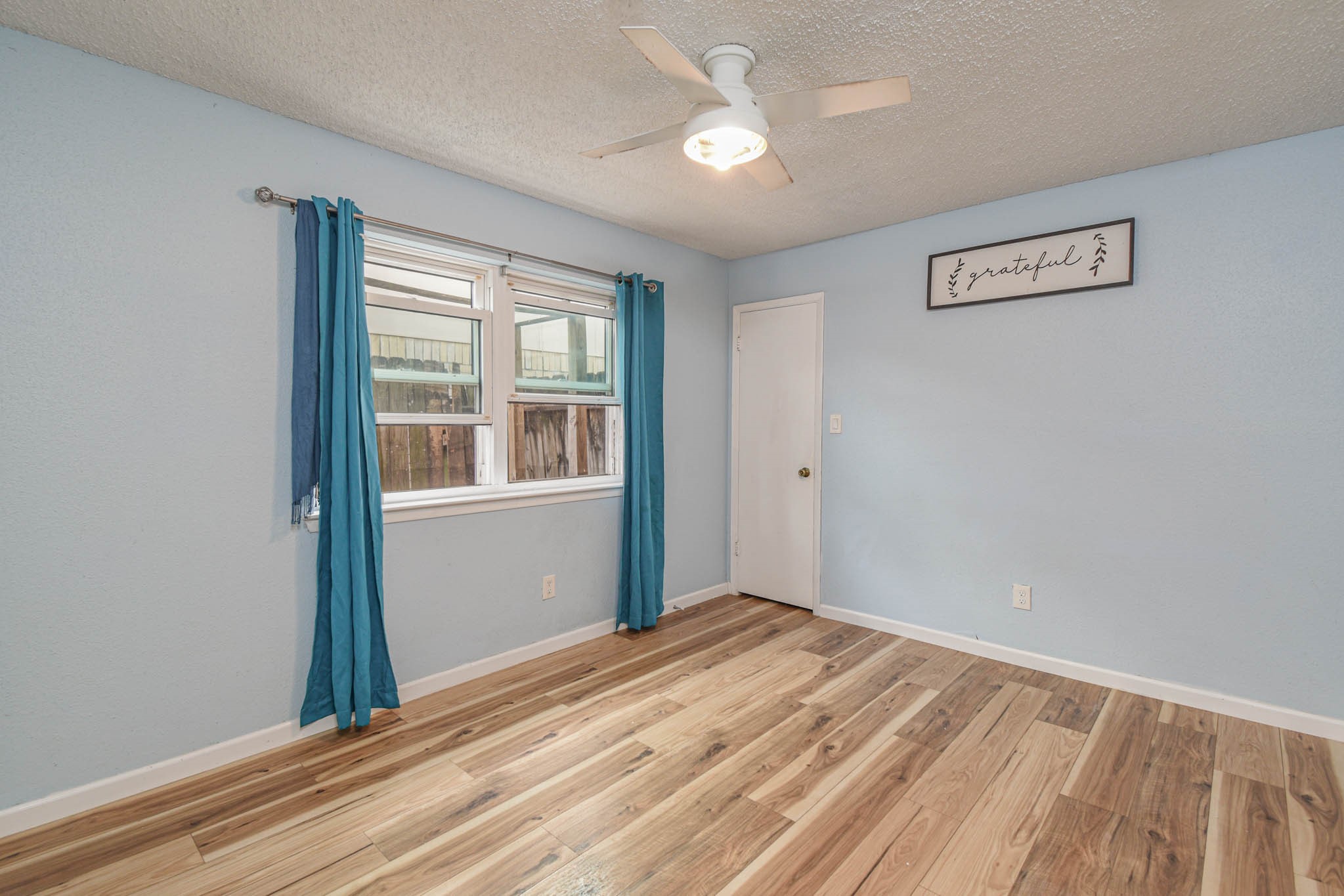 12054 Plumpoint Drive Houston, TX 77099 - Photo 14 of 24 a view of a room with a large window