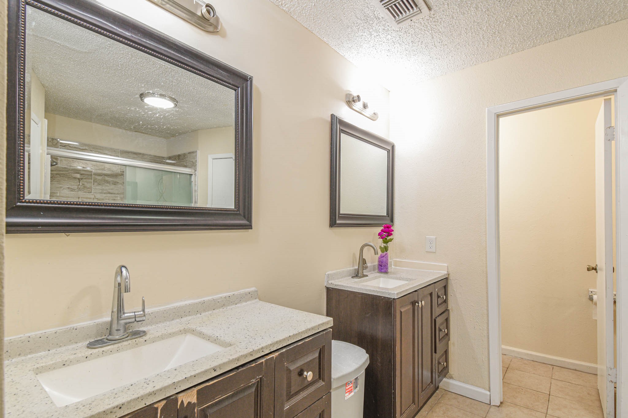 12054 Plumpoint Drive Houston, TX 77099 - Photo 20 of 24 a bathroom with a sink and a mirror