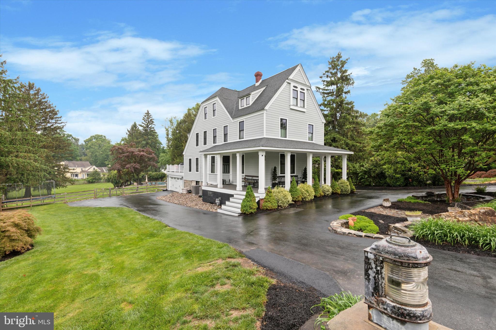 802 Upper Gulph Road Wayne, PA 19087 - Photo 1 of 45 a view of a house with swimming pool and sitting area