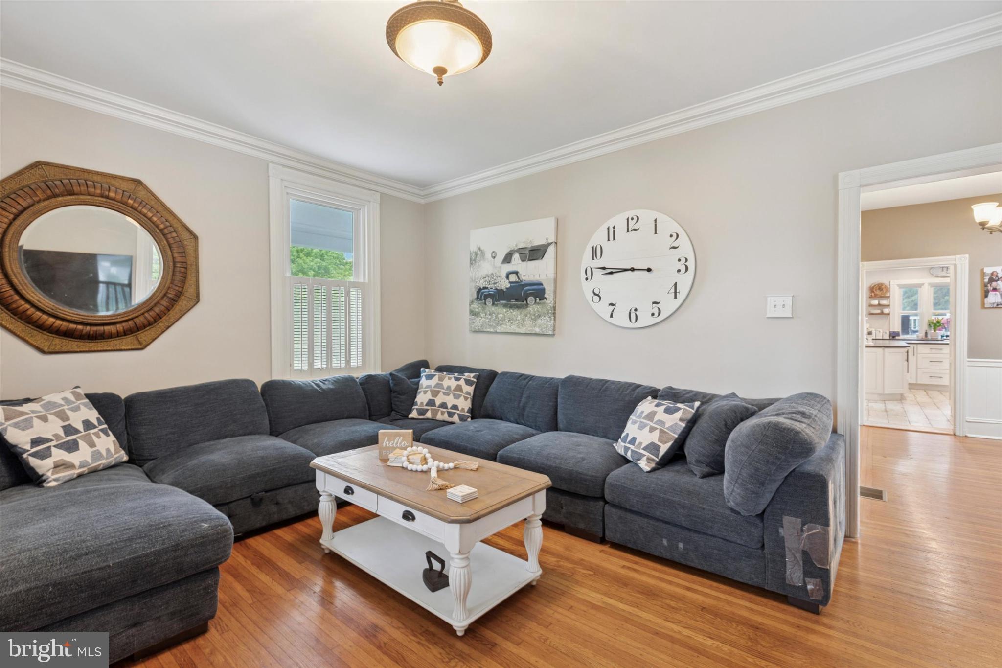802 Upper Gulph Road Wayne, PA 19087 - Photo 11 of 45 a living room with furniture and a window