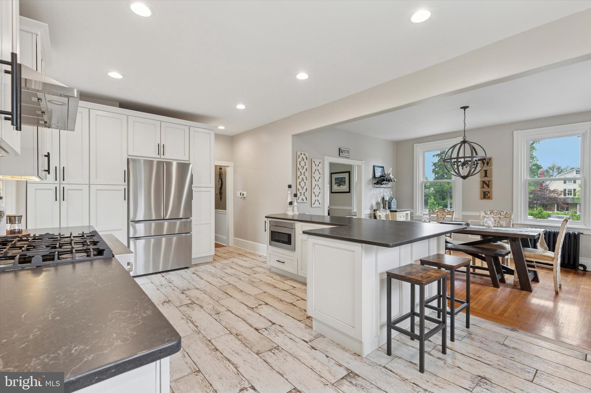 802 Upper Gulph Road Wayne, PA 19087 - Photo 16 of 45 a kitchen with stainless steel appliances granite countertop a refrigerator and a stove top oven