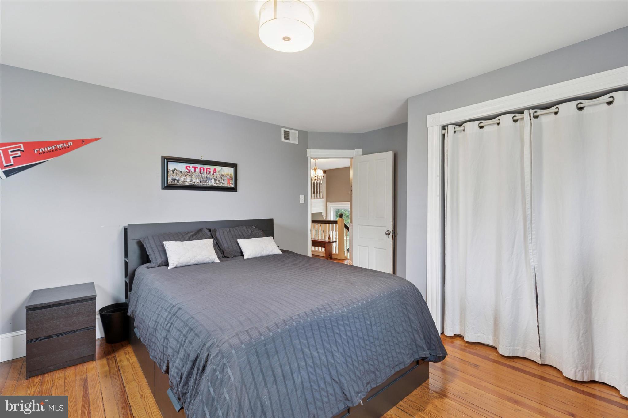 802 Upper Gulph Road Wayne, PA 19087 - Photo 20 of 45 a bedroom with a bed and a couch