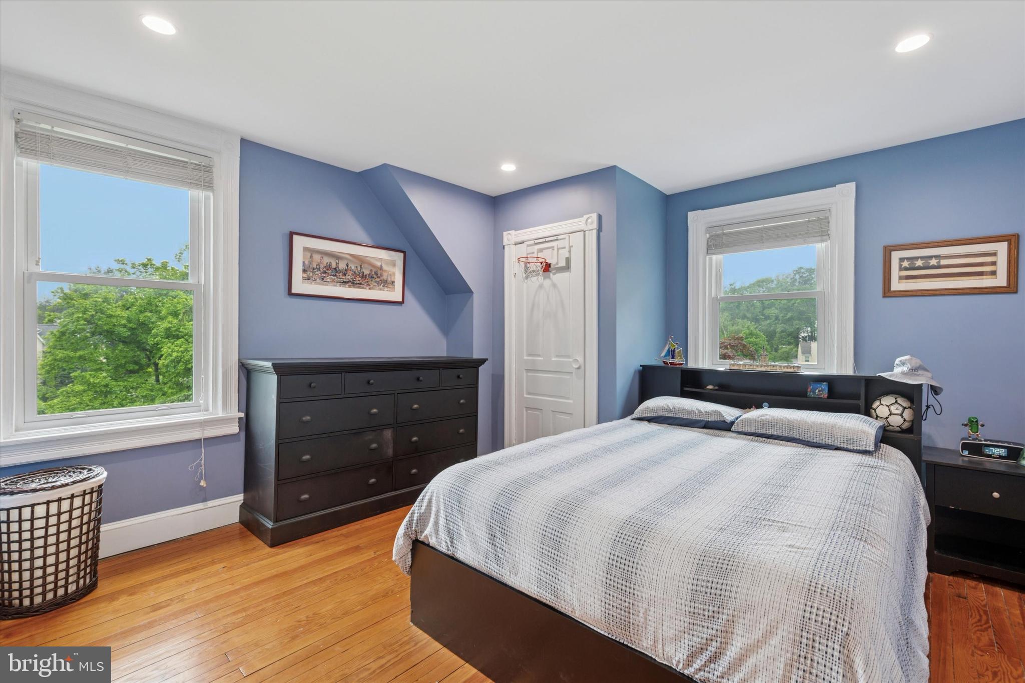 802 Upper Gulph Road Wayne, PA 19087 - Photo 24 of 45 a bedroom with a bed and a fireplace